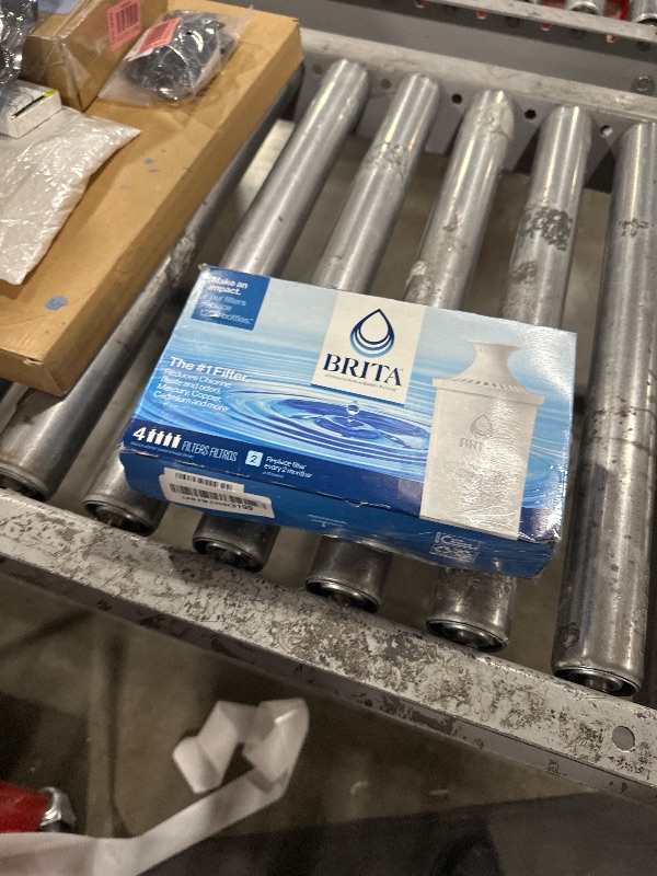 Photo 1 of Brita Standard Water Filter for Pitchers and Dispensers, BPA-Free, Reduces Copper, Cadmium and Mercury Impurities, Lasts Two Months or 40 Gallons, Includes 4 Filters for Pitchers