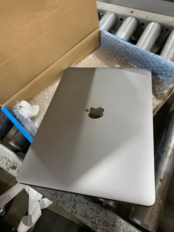 Photo 1 of Apple 2019 MacBook Pro with 1.4GHz Intel Core i5, 13-inch, 8GB RAM, 512GB SSD Space Gray (Renewed)