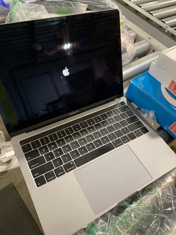Photo 1 of Apple 2019 MacBook Pro with 1.4GHz Intel Core i5 (13-inch, 8GB RAM, 128GB SSD) - Space Gray (Renewed)