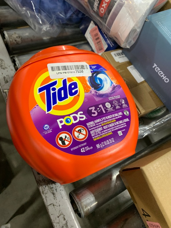 Photo 1 of Tide PODS Laundry Detergent Pacs, 3-in-1 Stain Remover, Odor Fighter, Color Protector, 42 Count, HE compatible, Spring Meadow Scent (Packaging May Vary)