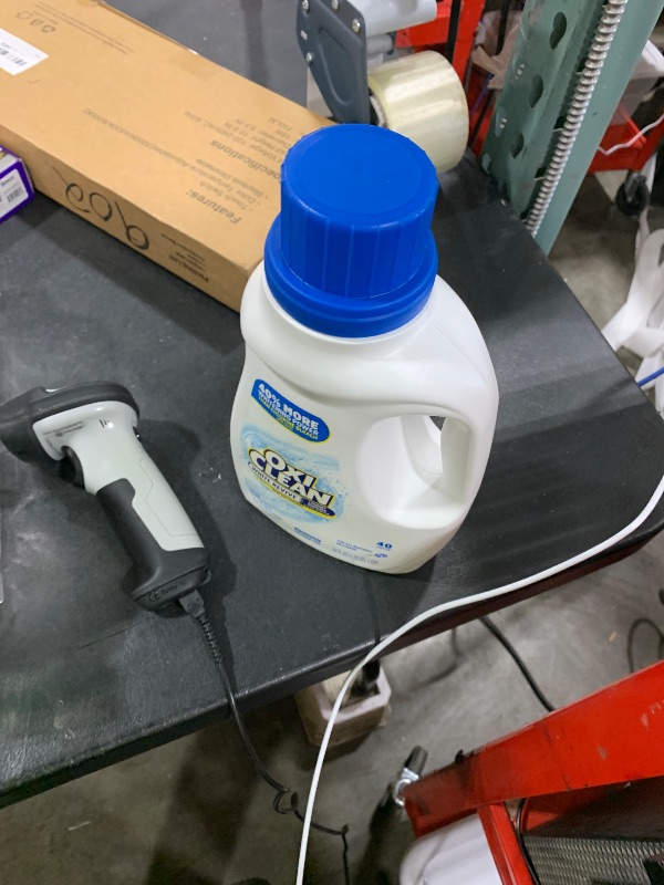 Photo 1 of OxiClean White Revive Laundry Whitener and Stain Remover Liquid, 50 fl oz