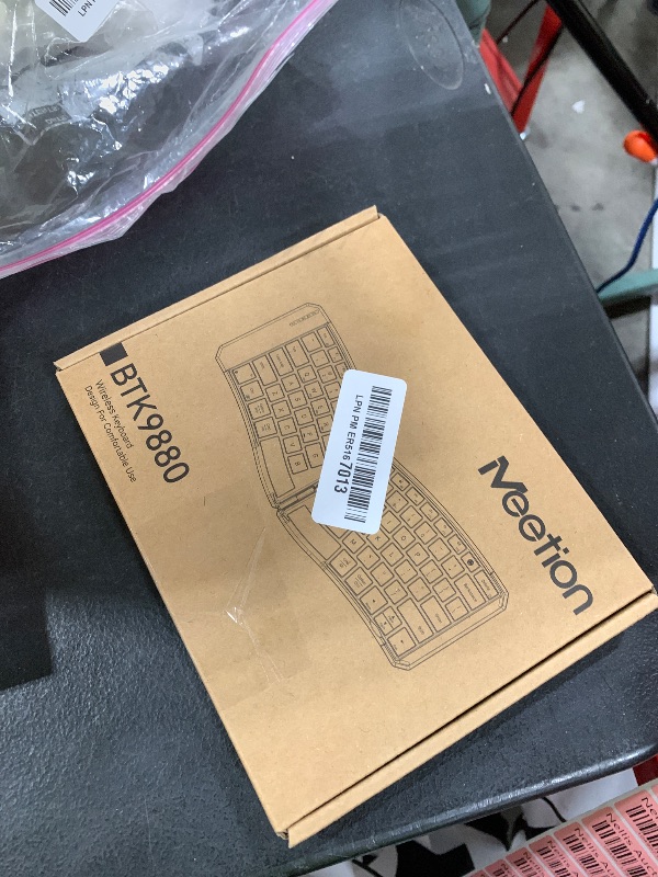 Photo 1 of MEETION Ergonomic Foldable Bluetooth Keyboard, Split Compact Portable Keyboard for Business Travel, Ultra-Thin Folding Rechargeable Wireless Keyboards for iOS Android Windows Mac Tablet PC Smartphone