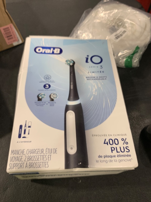 Photo 1 of Oral-B iO Deep Clean Rechargeable Electric Powered Toothbrush, Black with iO Series 3 Limited, 2 Brush Heads and Travel Case - Pressure Sensor to Protect Gums - 3 Cleaning Settings - 2 Minute Timer