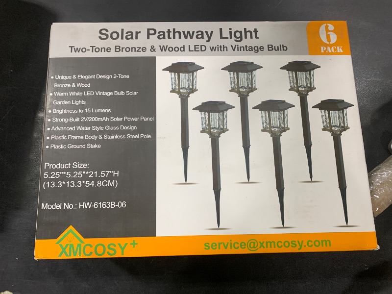 Photo 1 of XMCOSY+ Solar Outdoor Lights Waterproof IP65, Solar-Powered Garden/Yard/Pathway Lights with Warm White 2-Tone Bronze-Wood Stainless Steel Design for Landscape Driveway Walkway Decorative