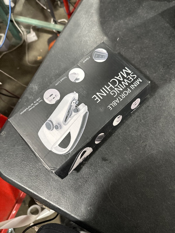 Photo 1 of Handheld Sewing Machine,Portable,Mini Sewing Machine,Easy to Use,Fast Sewing Speed,Suitable for Sewing Clothes1