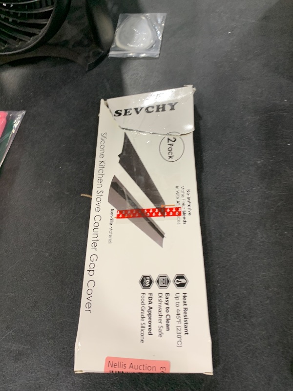 Photo 1 of SEVCHY Silicone Stove Gap Covers (2 pack), Oven Gap Filler, Heat Resistant Stove Gap Filler, Seal Gap between Stovetop and Counter, Easy Clean (21 inch, Black)