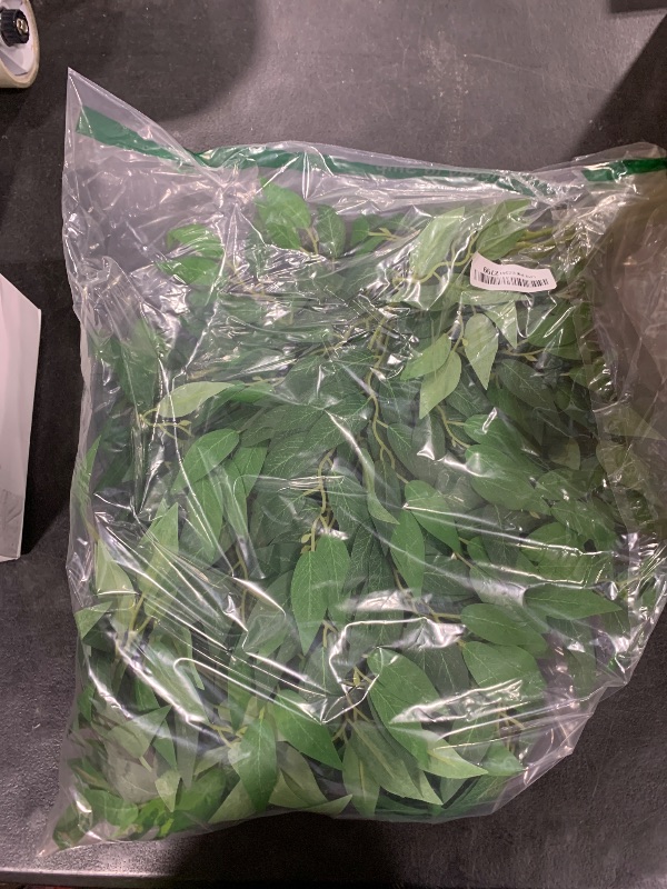 Photo 1 of WONICE Artificial Italian Ruscus Greenery Stems, Faux Green Leaf Garland Branches Hanging Greenery Spray for Wedding Bouquet Arch Table Centerpiece Home Decor (Green-40 Pack)
