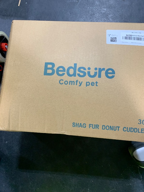 Photo 1 of Bedsure Calming Dog Bed for Medium Dogs - Donut Washable Medium Pet Bed, 30 inches Anti-Slip Round Fluffy Plush Faux Fur Cat Bed, Fits up to 45 lbs Pets, Frost Grey