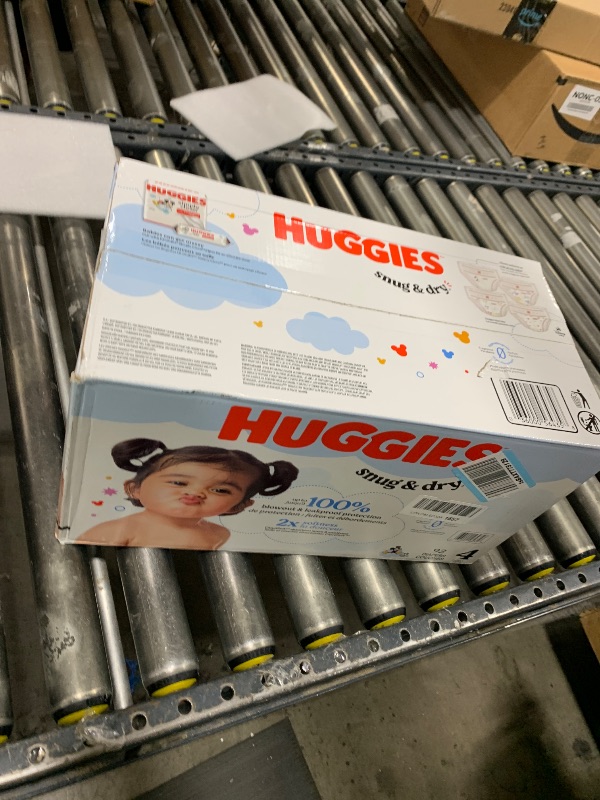 Photo 1 of Huggies Size 4 Diapers, Snug & Dry Baby Diapers, Size 4 (22-37 lbs), 92 Count, Packaging May Vary