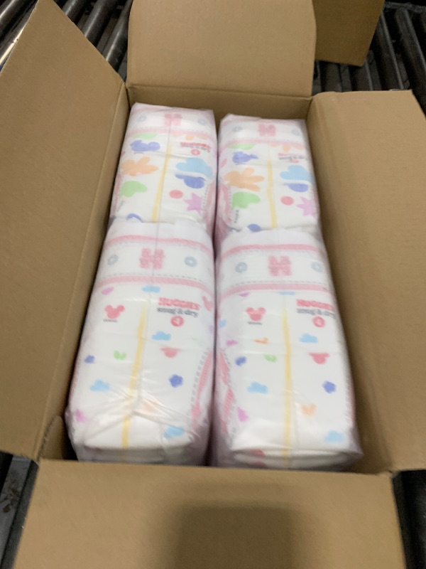 Photo 1 of Huggies Size 4 Diapers, Snug & Dry Baby Diapers, Size 4 (22-37 lbs), 92 Count, Packaging May Vary