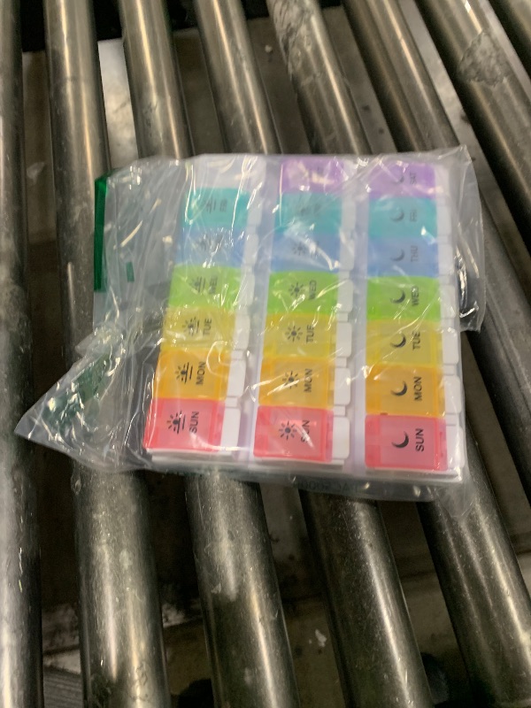 Photo 1 of EZY DOSE Weekly (7-Day) Pill Case, Daily Medicine Planner, Vitamin Organizer Container, Large Push Button Compartments, Easy to Use, 3 Times a Day, Spring Open Design, Rainbow Lids, BPA Free