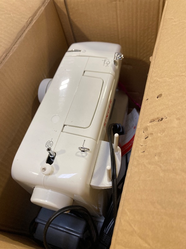 Photo 1 of SINGER Start 1304 Portable Sewing Machine | Lightweight, Beginner-Friendly with 57 Stitch Applications, Automatic Bobbin Winding & 4-Step Buttonhole | Includes Accessory Kit