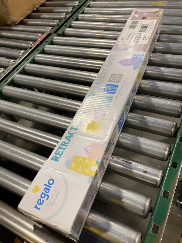 Photo 1 of Regalo Extra Wide Retractable Baby Gate, Award Winning Brand, Expands up to 50" Wide, Easy Install, Includes Installation Template, Locking Indicator