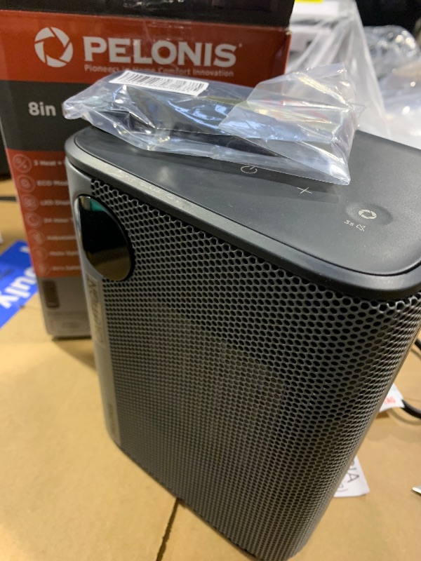 Photo 1 of  Pelonis 8-inch Digital Ceramic Heater. 