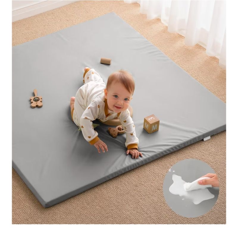 Photo 1 of OPEN BOX BABY PLAY MAT 47X47 FOAM CUSHIONED & REMOVEABLE WATERPROOF COVER