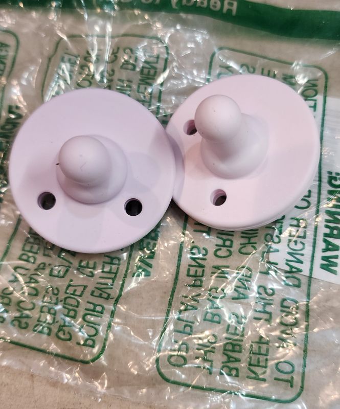 Photo 1 of Advent Soothie, 2 pack. pink and purple. 0-6 month, open pack.