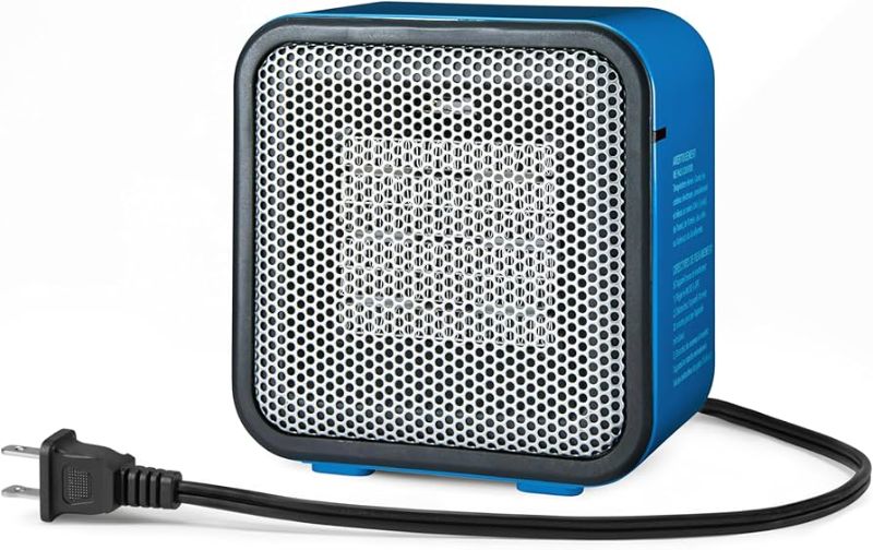 Photo 1 of Amazon Basics Ceramic Portable Mini Space Heater for Office Desk, Fast Heating, Efficient, Indoor Use, 500W, With Tip-Over Protection, Lightweight 1.4 lbs, Black, 5.9 x 3.2 x 6 inches

