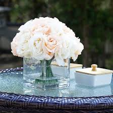 Photo 1 of Enova Floral 18 Pieces Artificial Silk Roses Fake Flower Arrangement in Cube Glass Vase with Faux Water for Home Office Wedding Decoration (Cream Beige)
