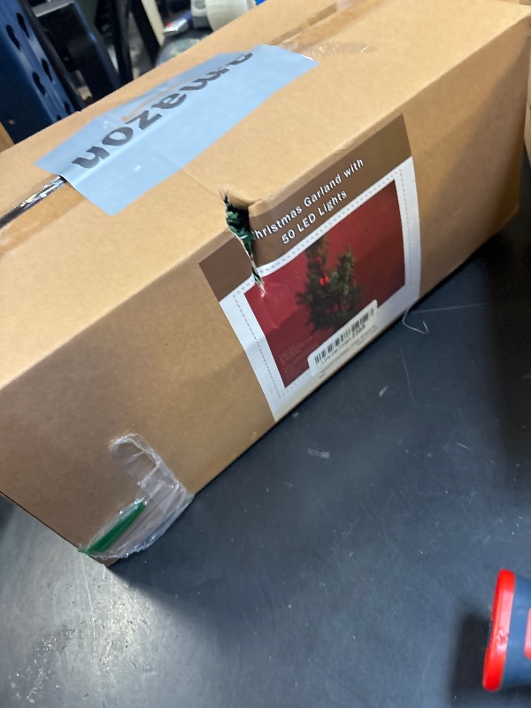 Photo 1 of MorTime 9 FT LED Christmas Garland with Pinecones Red Berries Bows Christmas Balls Candies, Multi-Function Christmas Garland with 50 Warm White LED Lights, 180 Branch Tips