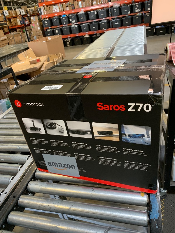 Photo 1 of roborock Saros Z70 Robot Vacuum and Mop, OmniGrip Arm, AI-Powered, 22,000Pa Suction, 3.14’’ Ultra Slim, FlexiArm Riser Technology, AdaptiLift Chassis, Obstacle Avoidance, Auto Mop Washing & Drying