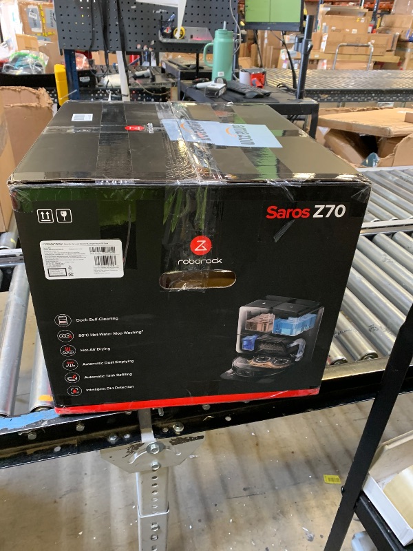 Photo 1 of roborock Saros Z70 Robot Vacuum and Mop, OmniGrip Arm, AI-Powered, 22,000Pa Suction, 3.14’’ Ultra Slim, FlexiArm Riser Technology, AdaptiLift Chassis, Obstacle Avoidance, Auto Mop Washing & Drying
