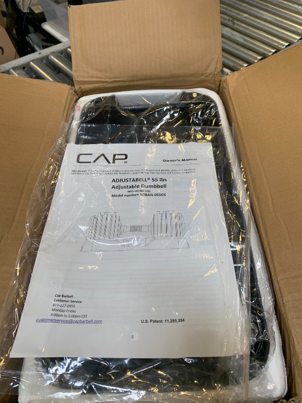 Photo 1 of **INCOMPLETE, 1 PIECE ONLY** CAP Barbell ADJUSTABELL® 55 lb SINGLE PIECE Adjustable Dumbbells with Contoured Full Rotation Handle, Honeycomb Chrome and Black Handle