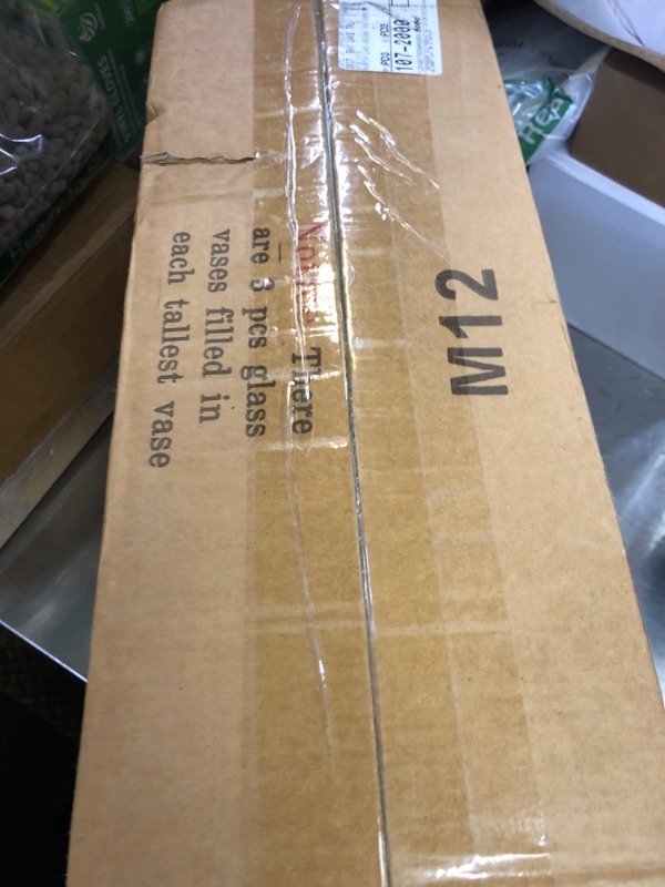 Photo 1 of 12 Pack Glass Cylinder Vases 4,6,8,10 Inch Tall Clear Flower Vase Hurricane Floating Candle Holder for Table Centerpiece Wedding Home Decor.