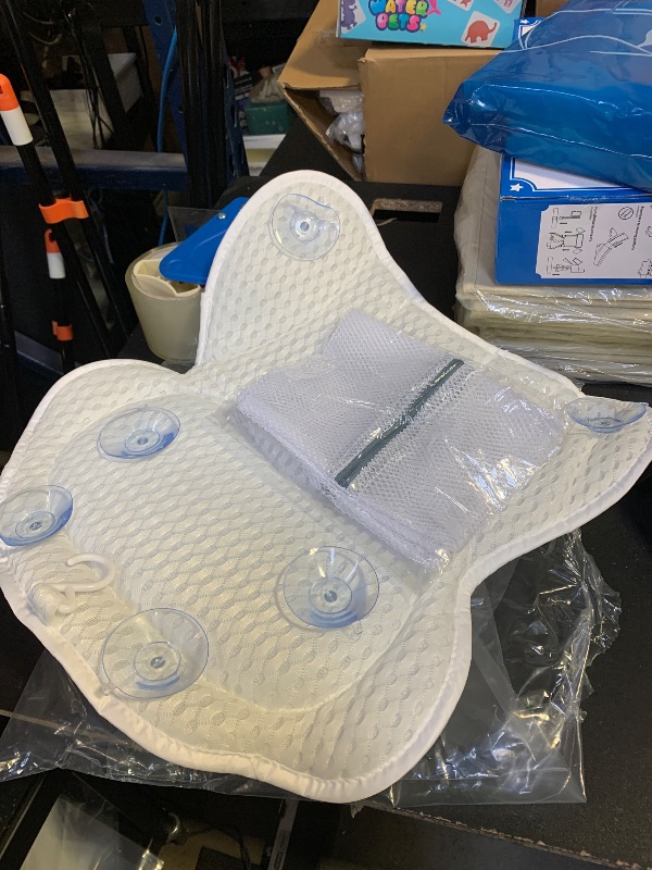 Photo 1 of 
bath pillow with six non-slip suction cups 