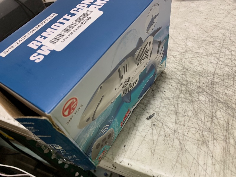 Photo 1 of ITEM IS MISSING PARTS, UNSURE WHAT PARTS ARE MISSING -------------------------------------------------------VEVOR Remote Control Shark Toy, 2.4GHz High Simulation Shark RC Boat for Swimming Pool Bathroom, Electric RC Fish Toy with 2 Batteries, Light & Spr