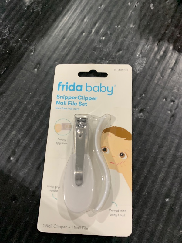 Photo 1 of Frida Baby NailFrida Baby Nail Clippers & Nail File & Buffer for Newborns and Up, Safety Spyhole, Nickel Free, Curved Clipper to Fit Babies Nails
