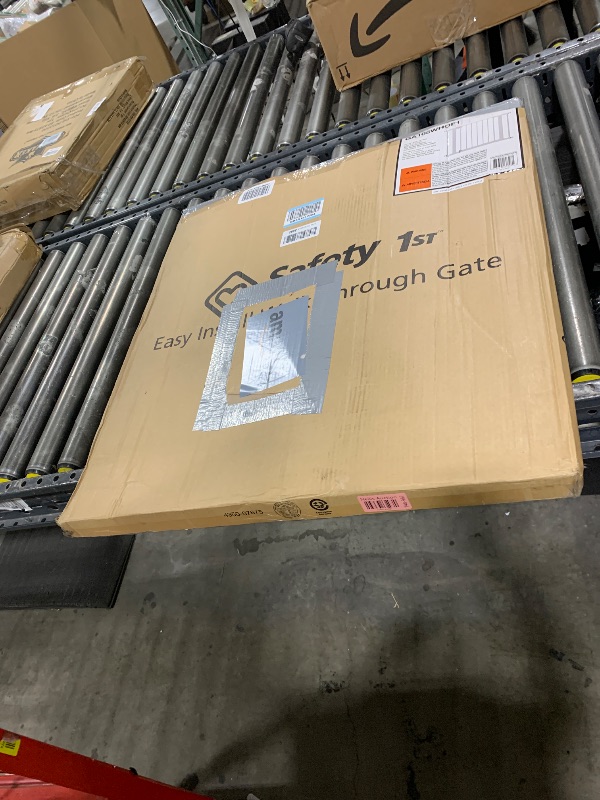 Photo 1 of Safety 1st Easy Install Walk Thru Baby Gate for Doorways, Gate With Door, Dog Gates, Fits 29"-38", Easy Install 28" Tall, White
