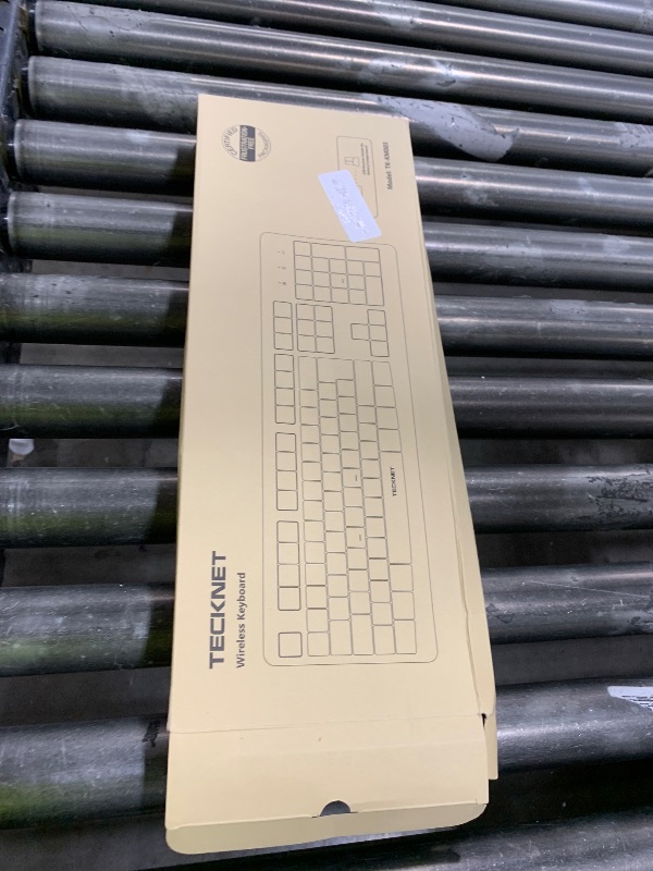 Photo 1 of TECKNET Wireless Keyboard, 2.4G Silent Full-Size USB Keyboard with Number Pad, Ergonomic Keys & Foldable Feet