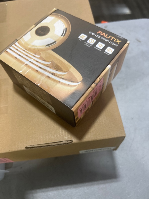 Photo 1 of PAUTIX COB LED Strip Light 16.4ft,Engineering Level UL Listed Warm White 2700K,CRI93+ Super Bright High Lumen,Dimmable 24V Flexible LED Tape Light with RF Remote,for Cabinets,Home&Office DIY Lighting