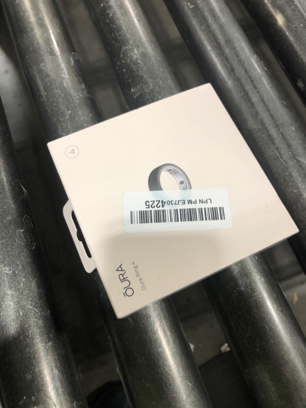 Photo 1 of Oura Ring 4 - Stealth - Size 4 - Smart Ring - Unique Sizing, Not Standard US Ring Sizes - Size First - Sleep Tracking Wearable - Heart Rate - Fitness Tracker - Up to 8 Days of Battery Life