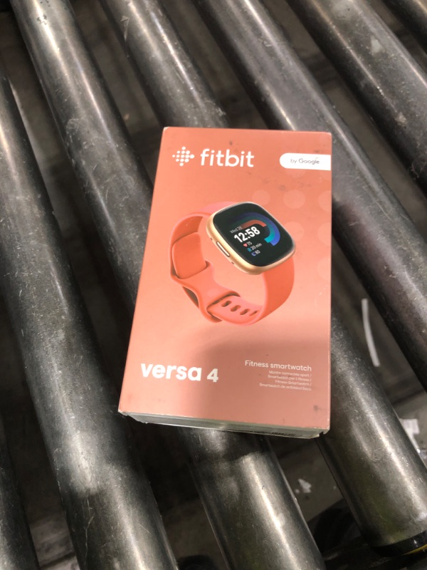 Photo 1 of Fitbit Versa 4 Fitness Smartwatch with Daily Readiness, GPS, 24/7 Heart Rate, 40+ Exercise Modes, Sleep Tracking and more, Pink Sand/Copper Rose, One Size (S & L Bands Included)
