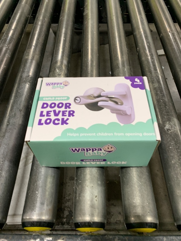 Photo 1 of Door Lever Locks (4 Pack) - Prevents Toddlers from Opening Doors - Durable ABS with 3M Adhesive - Easy One-Hand Operation for Adults, No Tools Needed
