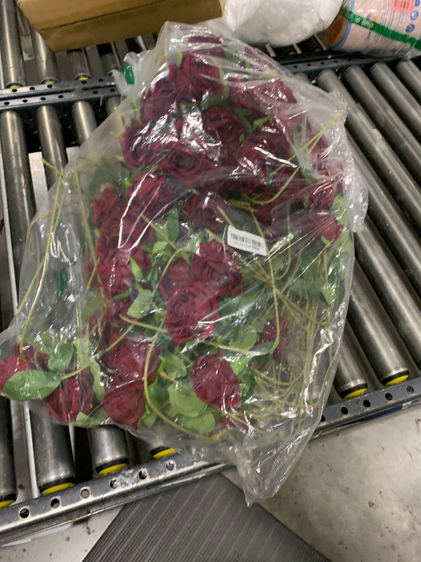 Photo 1 of Jexine 100 Pieces Artificial Roses Flowers Bulk, Long Stem Realistic Fake Silk Roses Bouquet for Table Centerpiece Vases Wedding Party Kitchen Decor(Wine Red)
