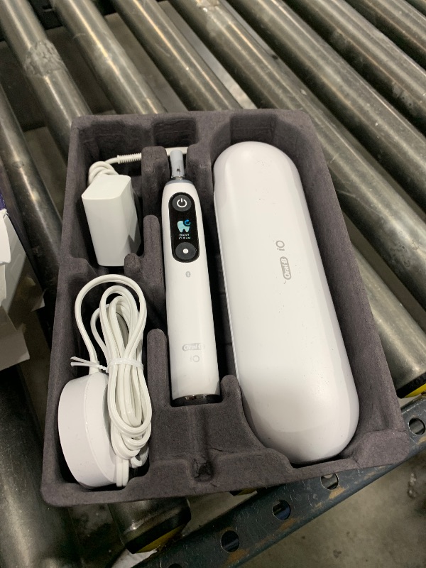 Photo 1 of Oral-B iO Series 9 Electric Toothbrush with 3 Replacement Brush Heads, White Alabaster