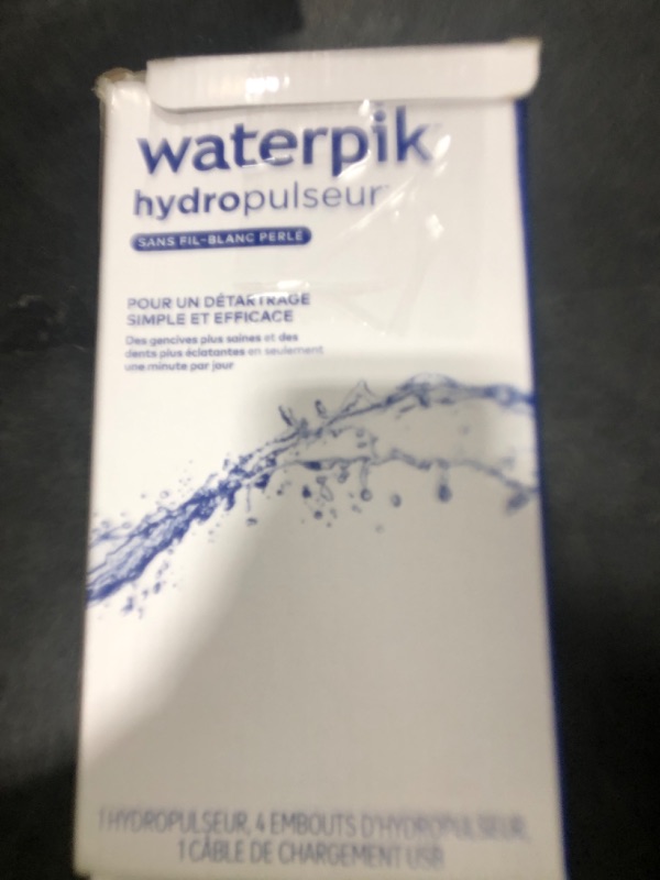 Photo 1 of Waterpik Cordless Pearl Rechargeable Portable Water Flosser for Teeth, Gums, Braces Care and Travel with 4 Flossing Tips - ADA Accepted, WF-13 White, Packaging May Vary