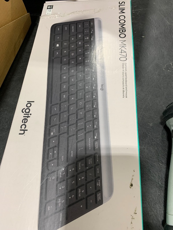 Photo 1 of Logitech MK470 Slim Wireless Keyboard and Mouse Combo - Modern Compact Layout, Ultra Quiet, 2.4 GHz USB Receiver, Plug n' Play Connectivity, Compatible with Windows - Graphite