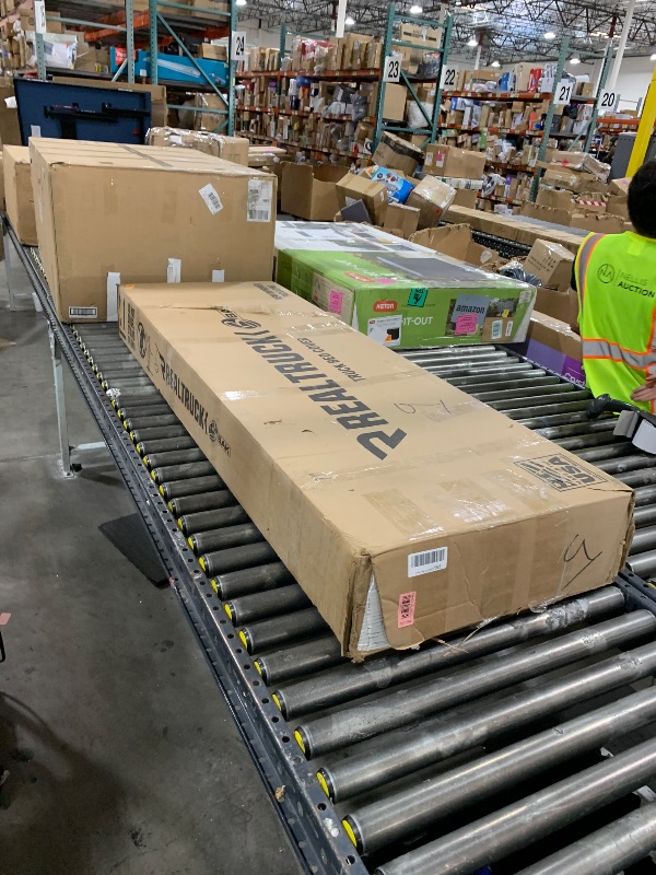 Photo 1 of RealTruck BAK MX4 TS Hard Folding Truck Bed Tonneau Cover | 449538TS | Fits 2022-2025 Nissan Frontier w/or w/o Track System 5' 0" Bed (60")