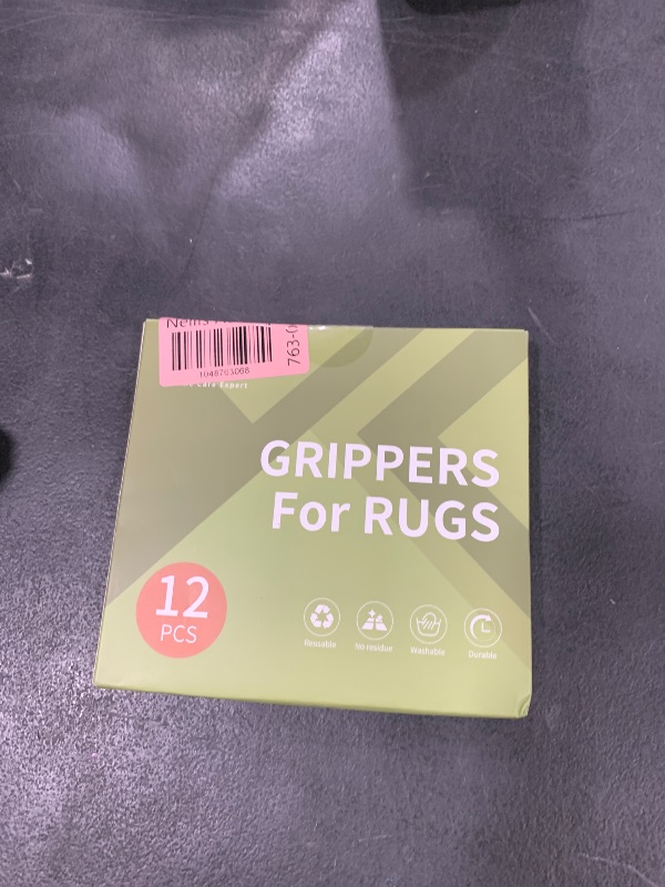 Photo 1 of Rabenda 12 Pcs Rug Tape, Non Slip Rug Pads Grippers for Hardwood Floors and Tiles, Reusable Carpet Tape for Area Rugs, Double-Sided Adhesive Rug Stickers Keep Corners Flat (Black)