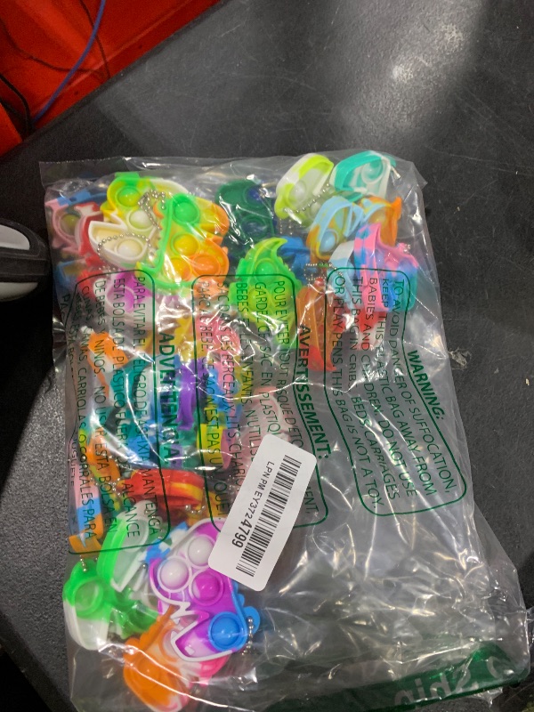 Photo 1 of Dinosaur Party Favors Dinosaur Keychains Kids Party Favors Fidget Toys Bulk 30 Pack Mini Pop Fidget Keychain Its, Dino Favors for Kids 4-8 Children Mini Supplies It Small Birthday Decorations Trinkets
