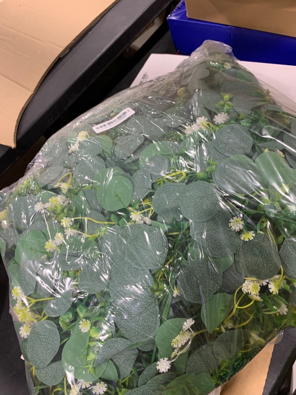 Photo 1 of CQURE 8 Pack 5.9Ft Eucalyptus Garland,Artificial Eucalyptus Flowers Leaves Table Greenery Garland Wreath Vines for Wedding Party Table Bedroom Wall Decor
