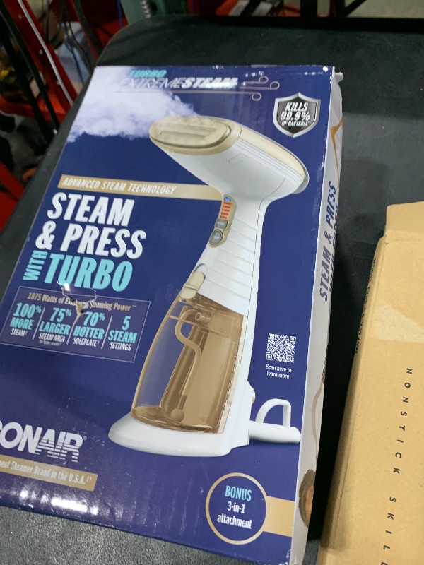Photo 1 of Conair Handheld Garment Steamer for Clothes, Turbo ExtremeSteam 1875W Fabric Steamer, Portable Handheld Design, Strong Penetrating Steam, Amazon Exclusive, White/Champagne