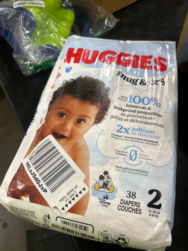 Photo 1 of Huggies Size 2 Diapers, Snug & Dry Baby Diapers, Size 2 (12-18 lbs), 38 Count, Packaging May Vary