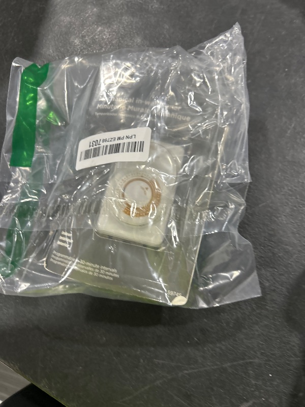 Photo 1 of Woods 59745 59745WD 24-Hour Mechanical Converts A Wall Light Switch to Timer (White)