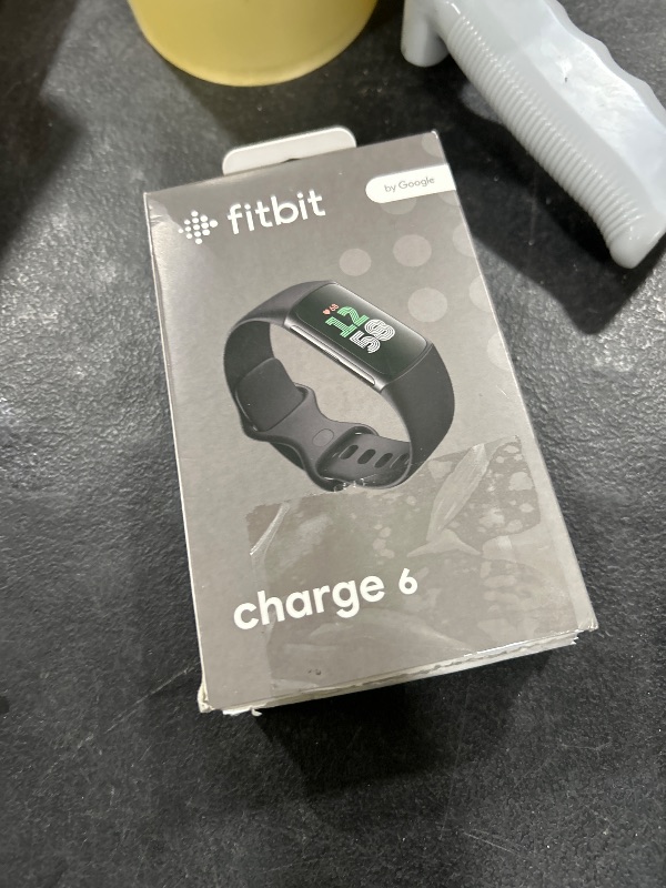 Photo 1 of Fitbit Charge 6 Fitness Tracker with Google apps, Heart Rate on Exercise Equipment, 6-Months Premium Membership Included, GPS, Health Tools and More, Obsidian/Black, One Size (S & L Bands Included)