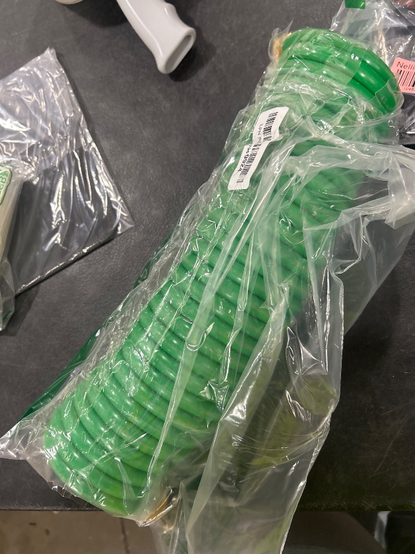 Photo 1 of Powertech EVA Recoil Garden Hose, Green, 25 FT with Brass Connectors, 1 Pack