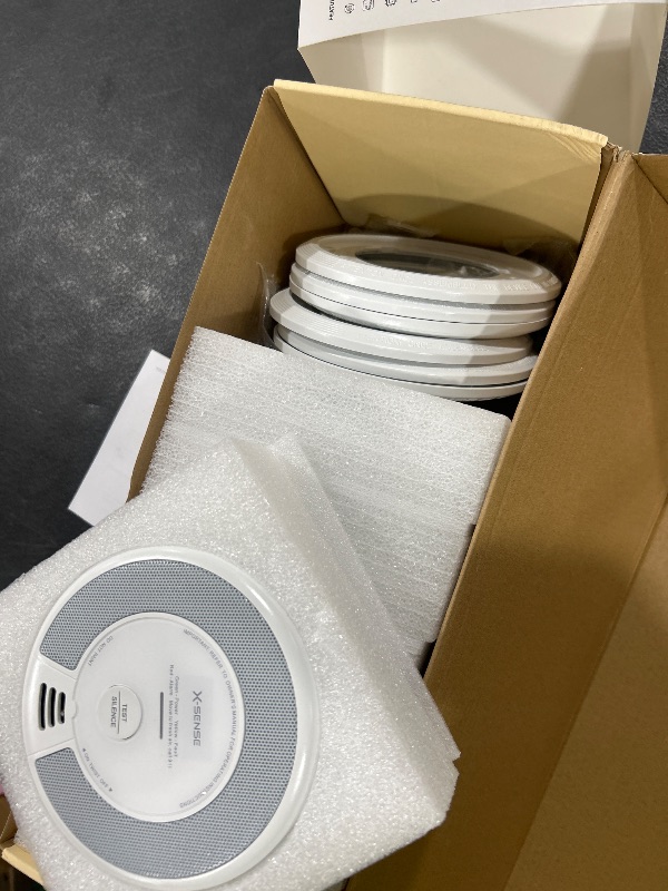 Photo 1 of X-Sense Wireless Interconnected Combination Smoke and Carbon Monoxide Detector, 10-Year Battery Powered Fire and CO Alarm, SC06-W, 6-Pack